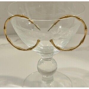 Large gold bamboo design hoop earrings